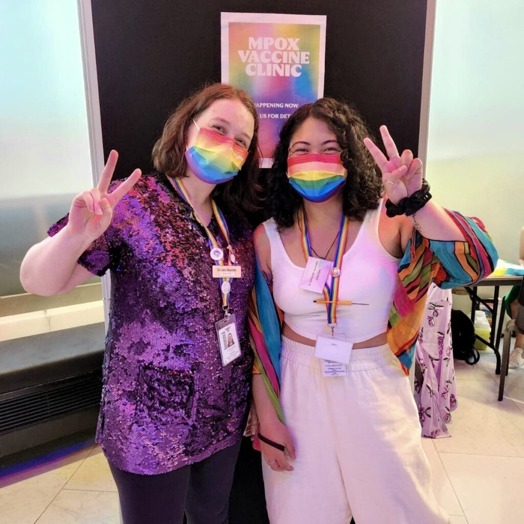 Jennifer and a colleague at the MPox  Vaccine Clinic Poster