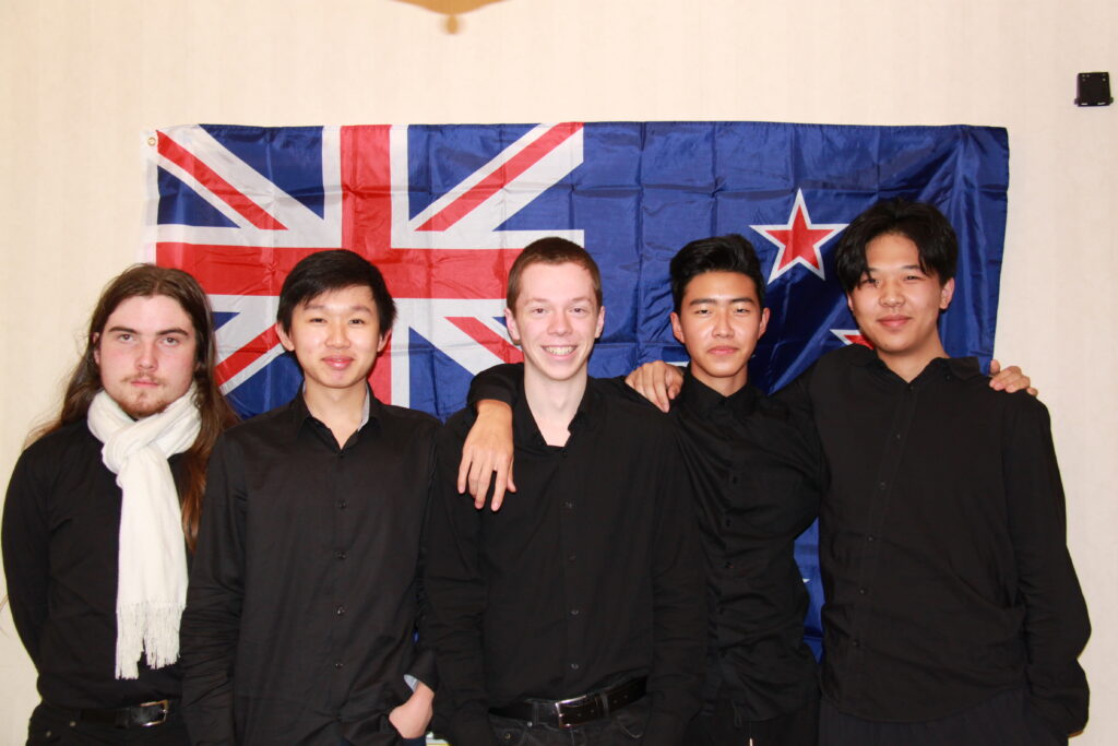 With Kiwi team members to the Online Young Physicists’ Tournament (left to right): Atom Gush, Nelson Huang, Benjy Smith, Michael Feng and Ethan Fung